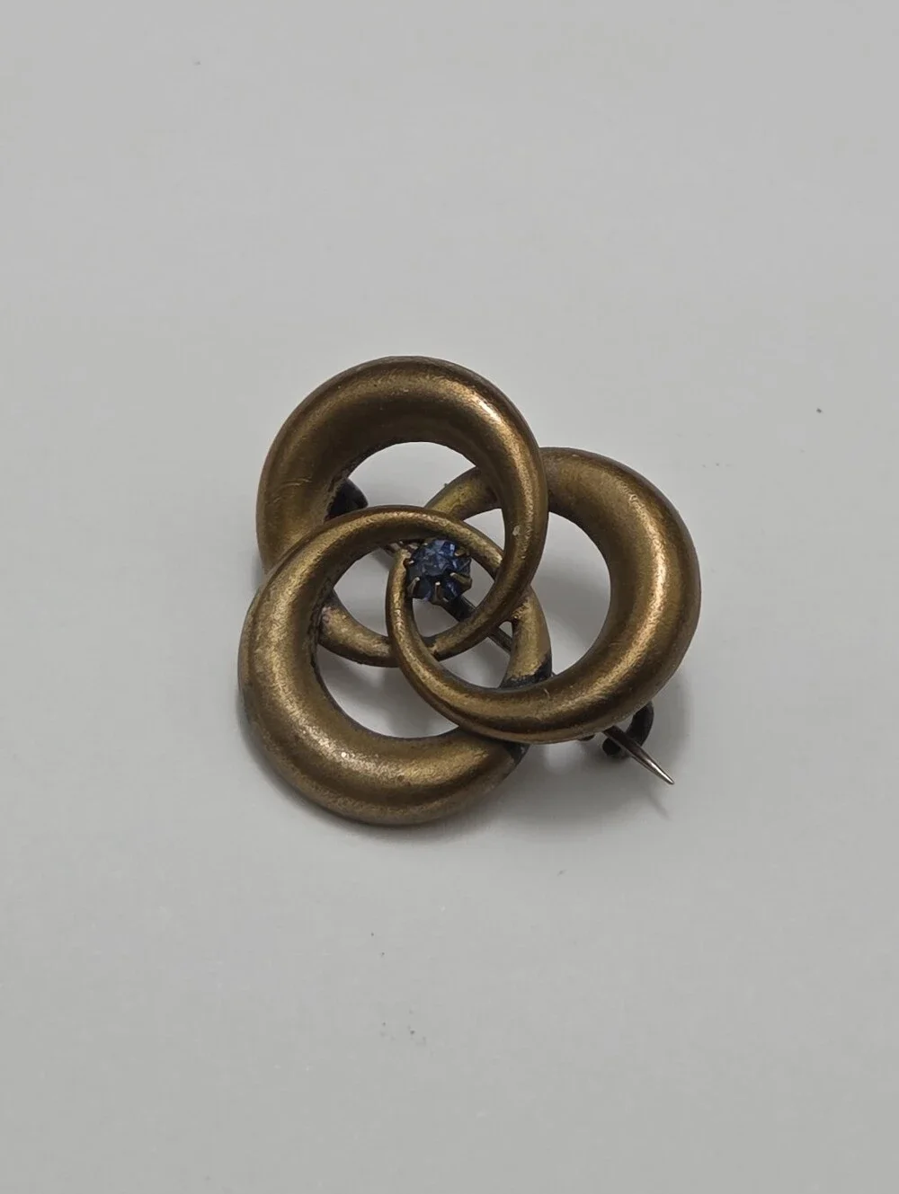 Antique 1900s Brass & Blue Stone Love Knot Brooch Pin